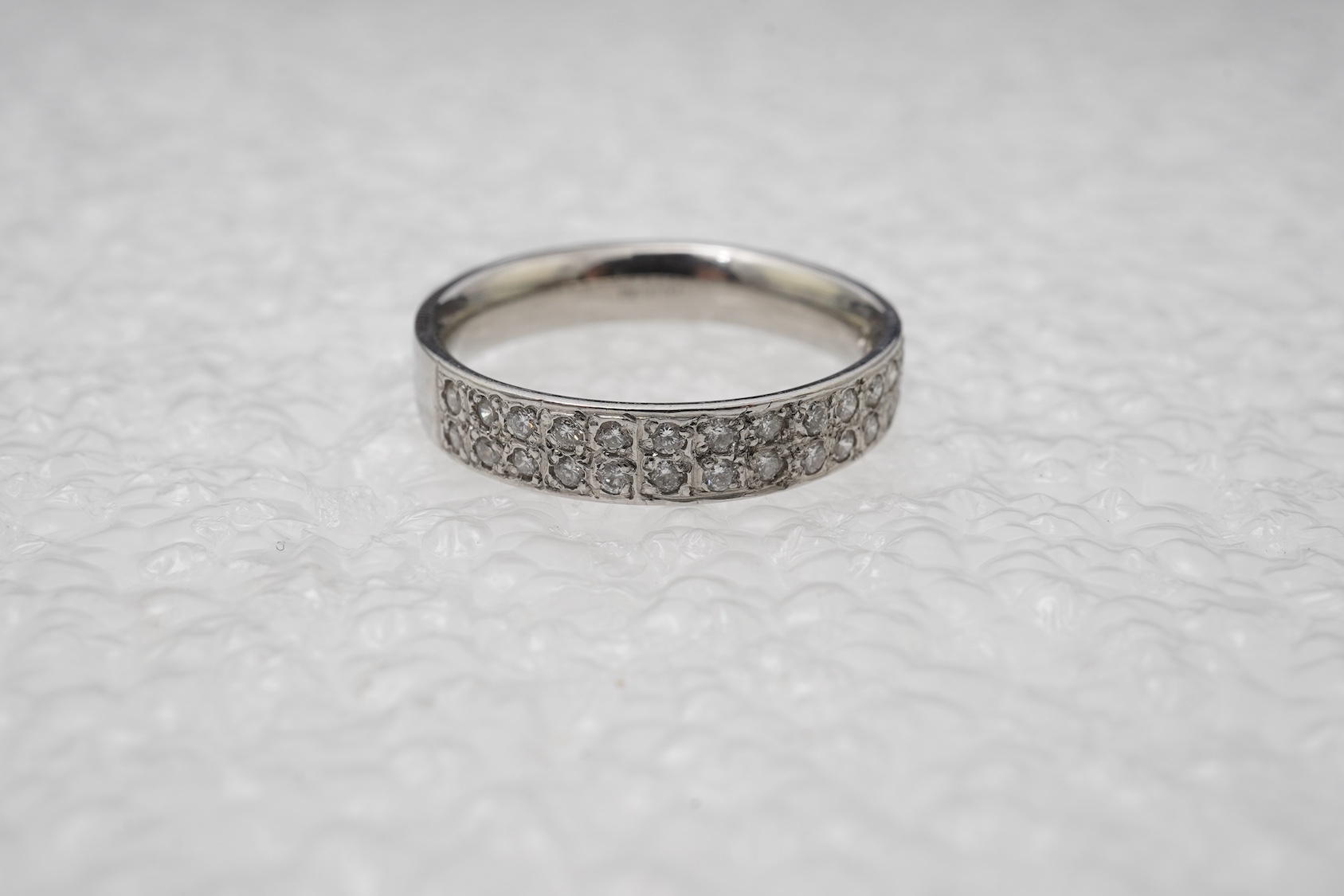 A diamond half eternity ring
